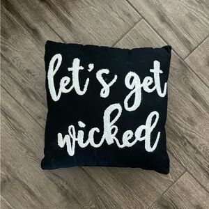 Let’s get wicked square black pillow white textured lettering Halloween